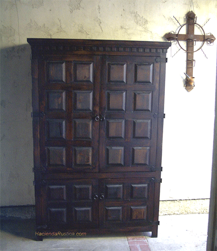 Spanish style armoire dark raised panels