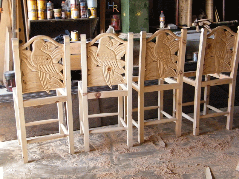 carved chairs macaw