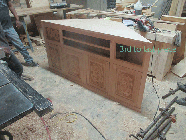 custom carved TV stand