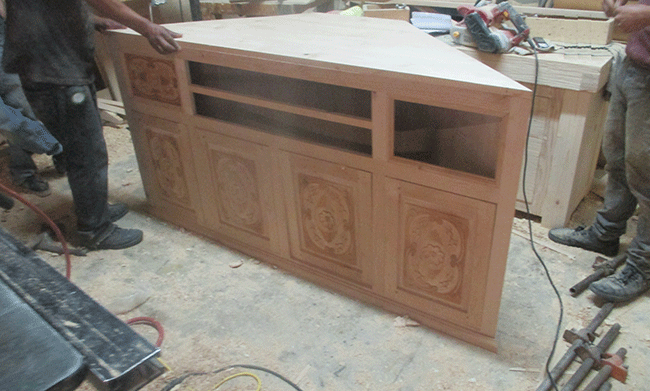 custom carved TV stand